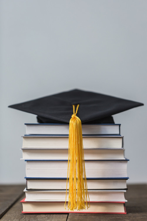 Books  & Graduation Cap